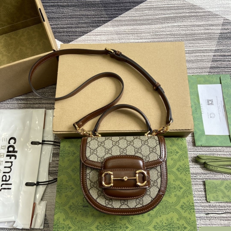G*u*i top handle bags
